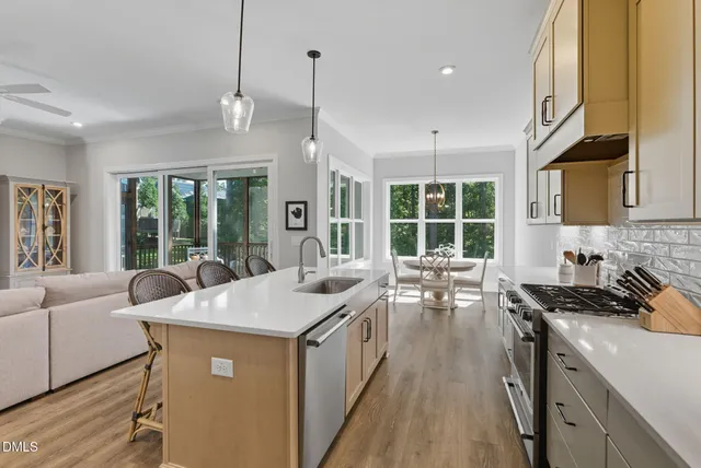 a spacious bedroom with a bed and a window
