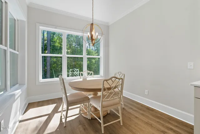 a bedroom with a bed and a lamp