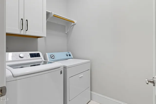 a workspace with furniture and a window