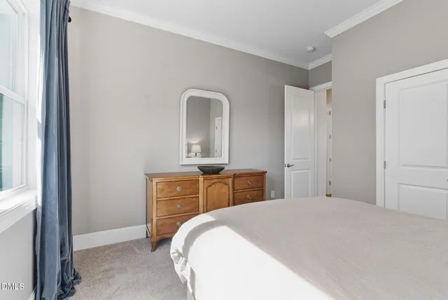 a backyard of a house with yard and outdoor seating