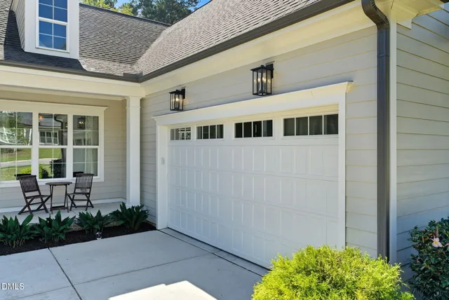 a view of a house with a table and chair
