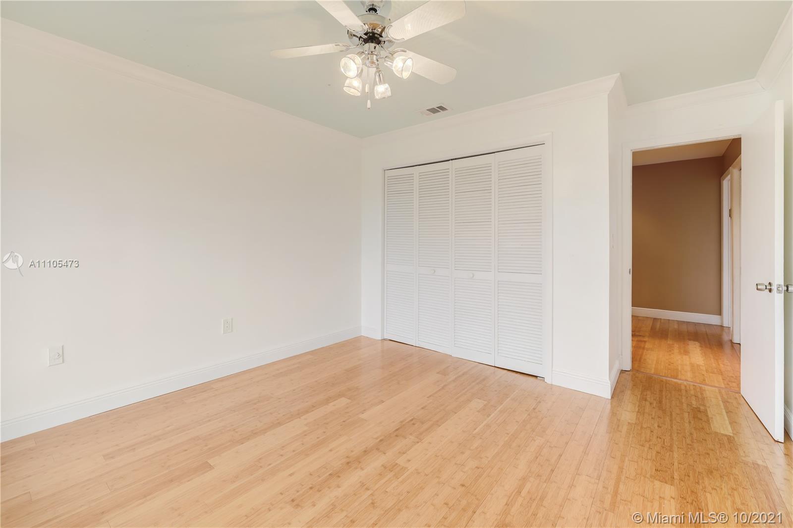 330 Southwest 133rd Place Miami, FL 33184 - Photo 35 of 51 a view of an empty room with wooden floor