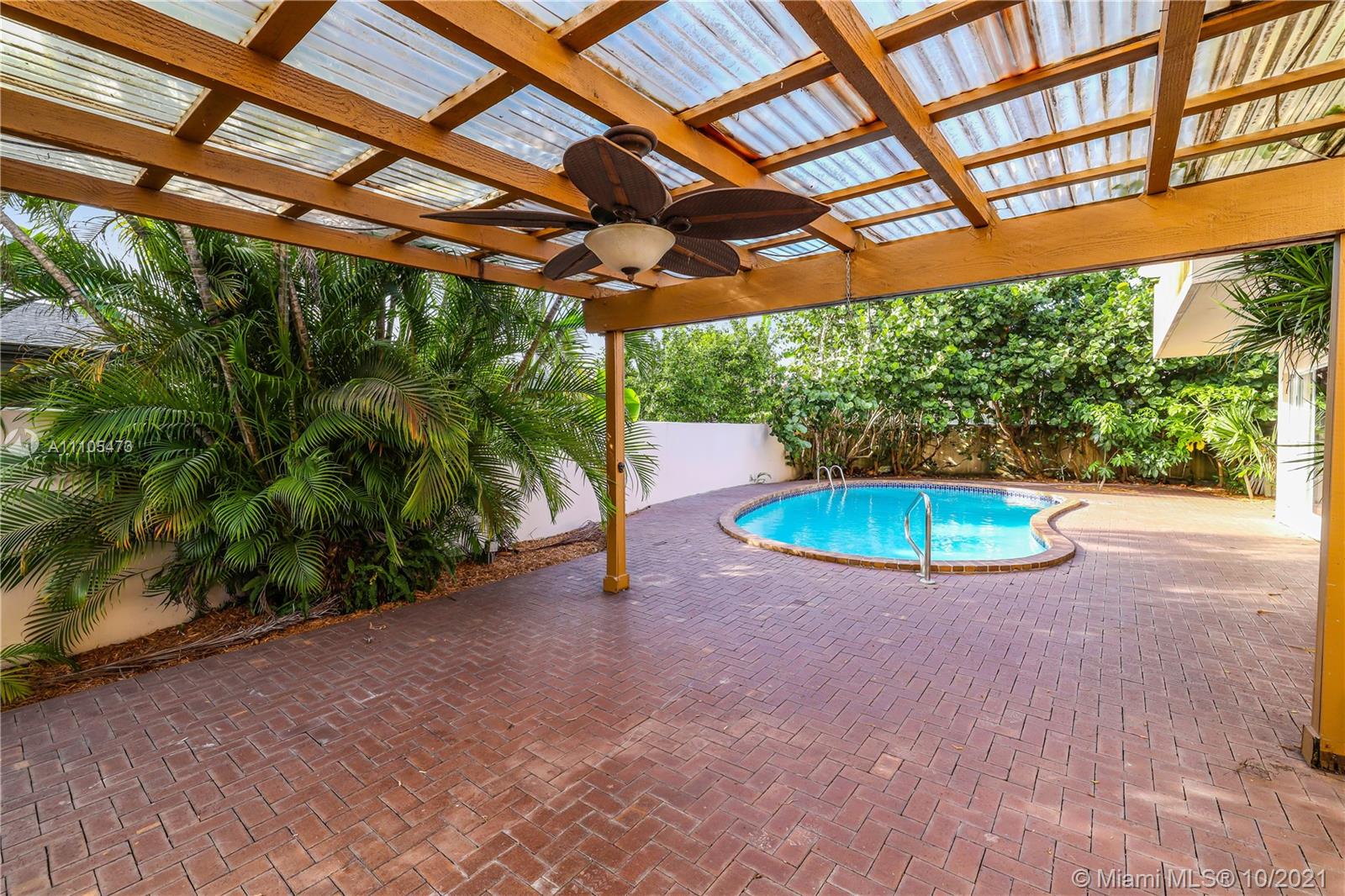 330 Southwest 133rd Place Miami, FL 33184 - Photo 45 of 51 front view of a house with a yard