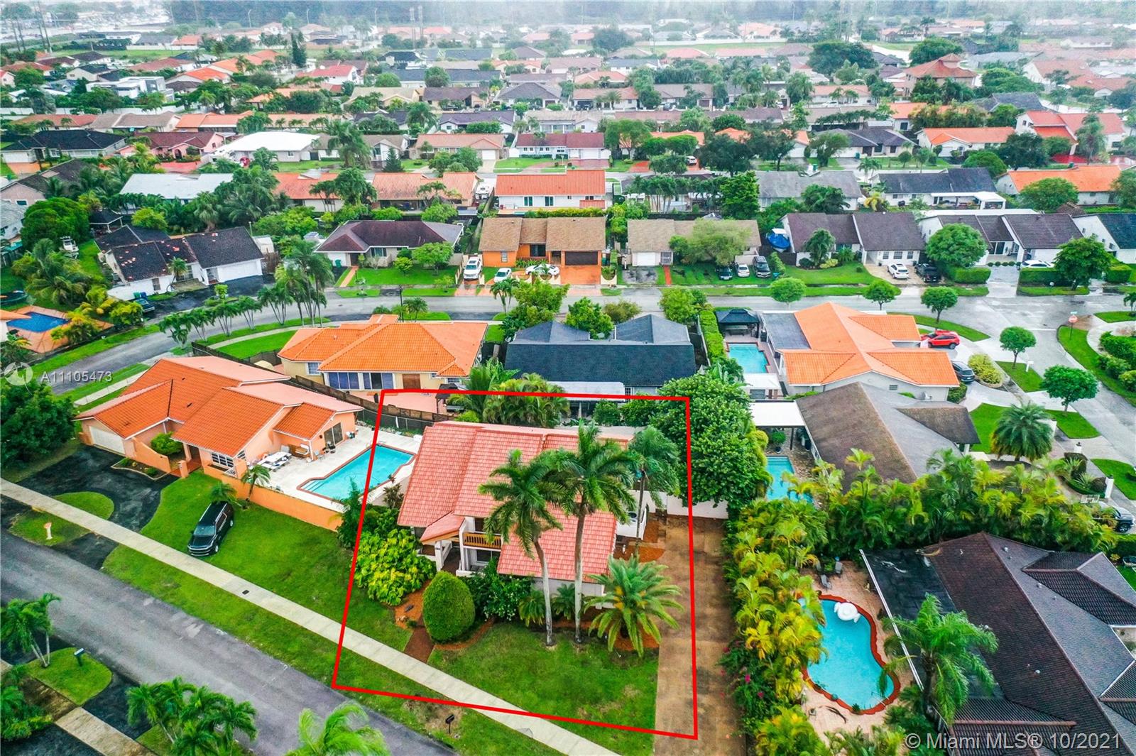 330 Southwest 133rd Place Miami, FL 33184 - Photo 49 of 51 an aerial view of residential houses with outdoor space and trees all around