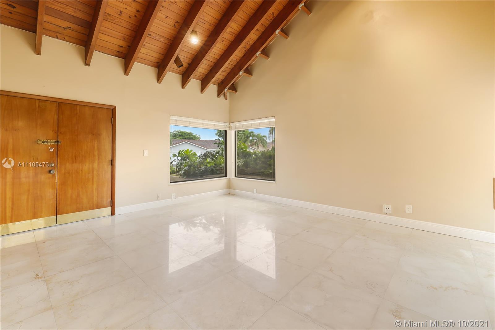 330 Southwest 133rd Place Miami, FL 33184 - Photo 9 of 51 an empty room with windows
