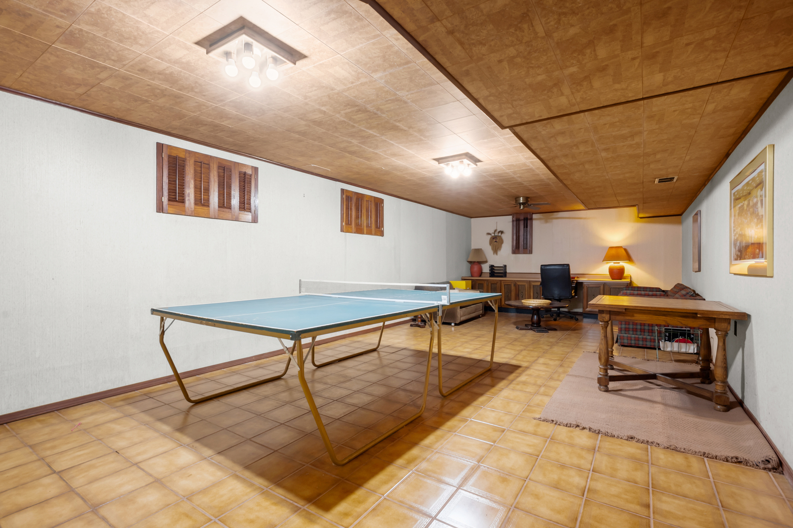 1010 South Green Bay Road Lake Forest, IL 60045 - Photo 21 of 25 a living room with furniture a table and a potted plant