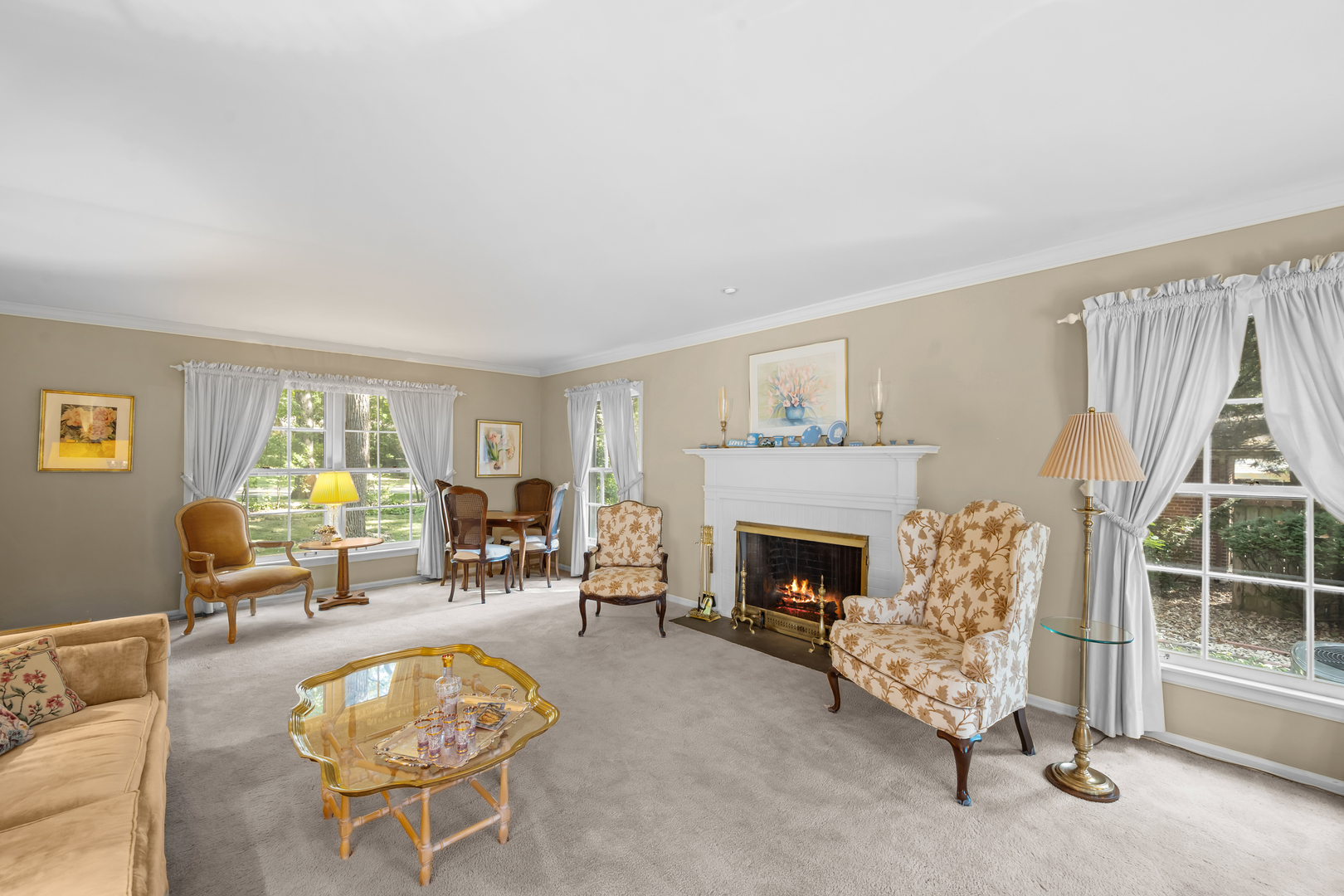 1010 South Green Bay Road Lake Forest, IL 60045 - Photo 6 of 25 a living room with furniture a fireplace and a table