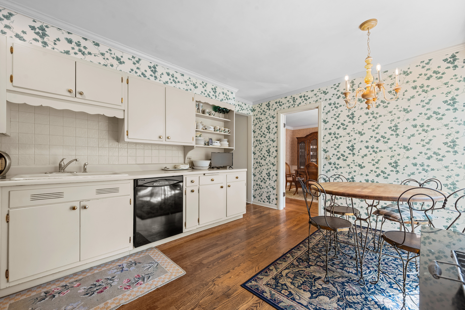 1010 South Green Bay Road Lake Forest, IL 60045 - Photo 9 of 25 a kitchen with stainless steel appliances kitchen island granite countertop a sink and cabinets
