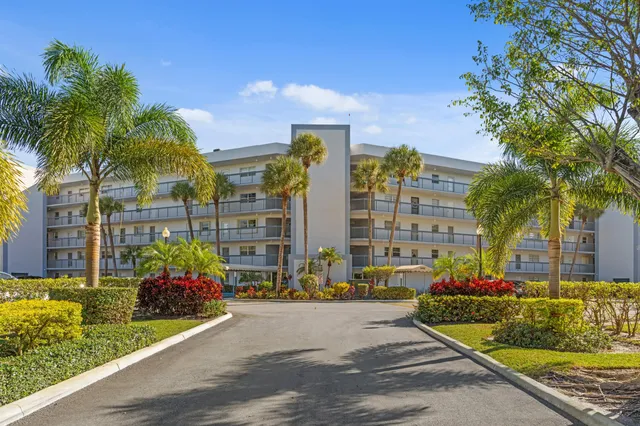 a building with trees in front of it