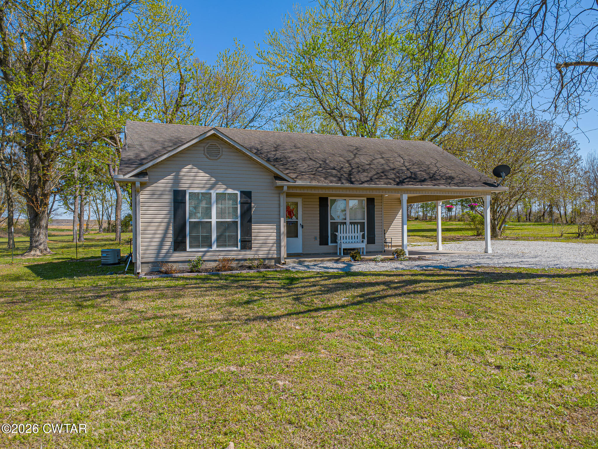 916 Landfill Road Brownsville, TN 38012 - Photo 3 of 21 a view of a house with a swimming pool and porch