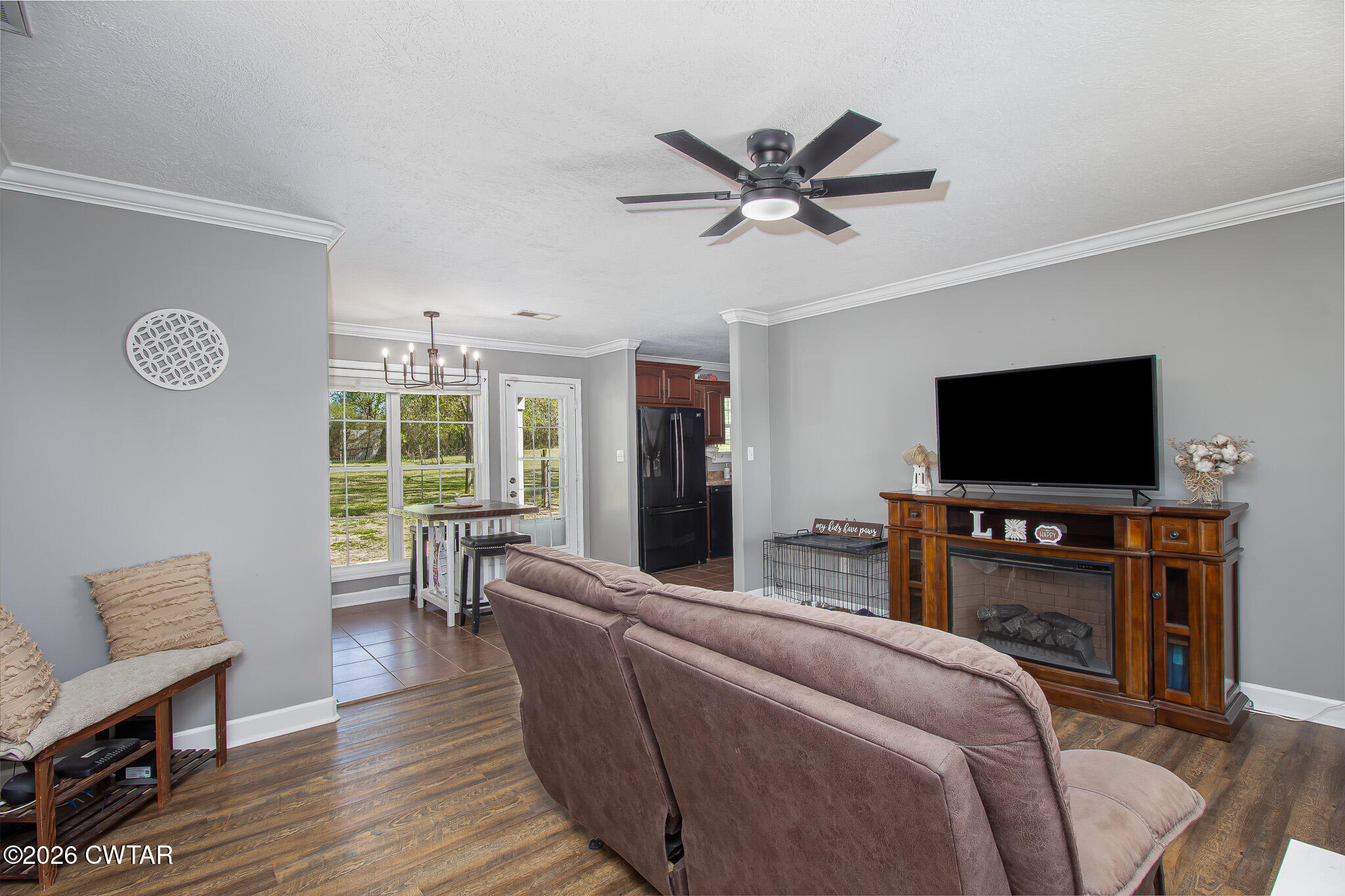 916 Landfill Road Brownsville, TN 38012 - Photo 7 of 21 a living room with furniture and a flat screen tv