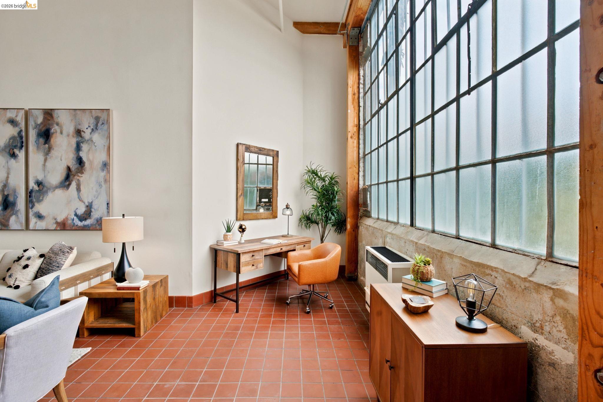 1920 Union Street, Unit 9 Oakland, CA 94607 - Photo 3 of 35 Expansive industrial-style windows with metal framing