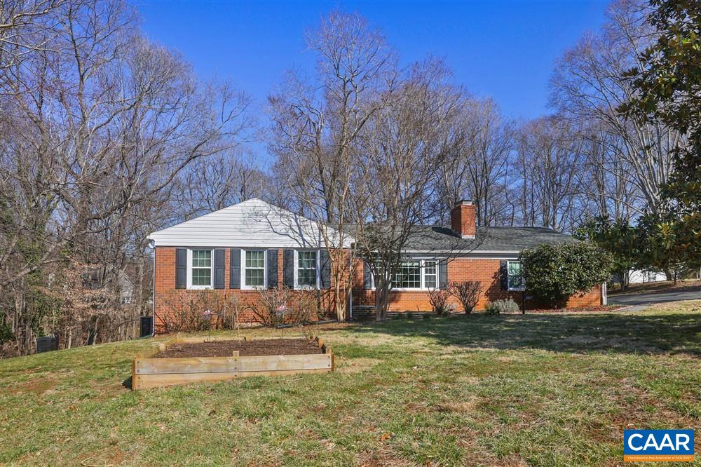 2807 Northfield Road Charlottesville, VA 22901 - Photo 1 of 35 a front view of a house with a yard