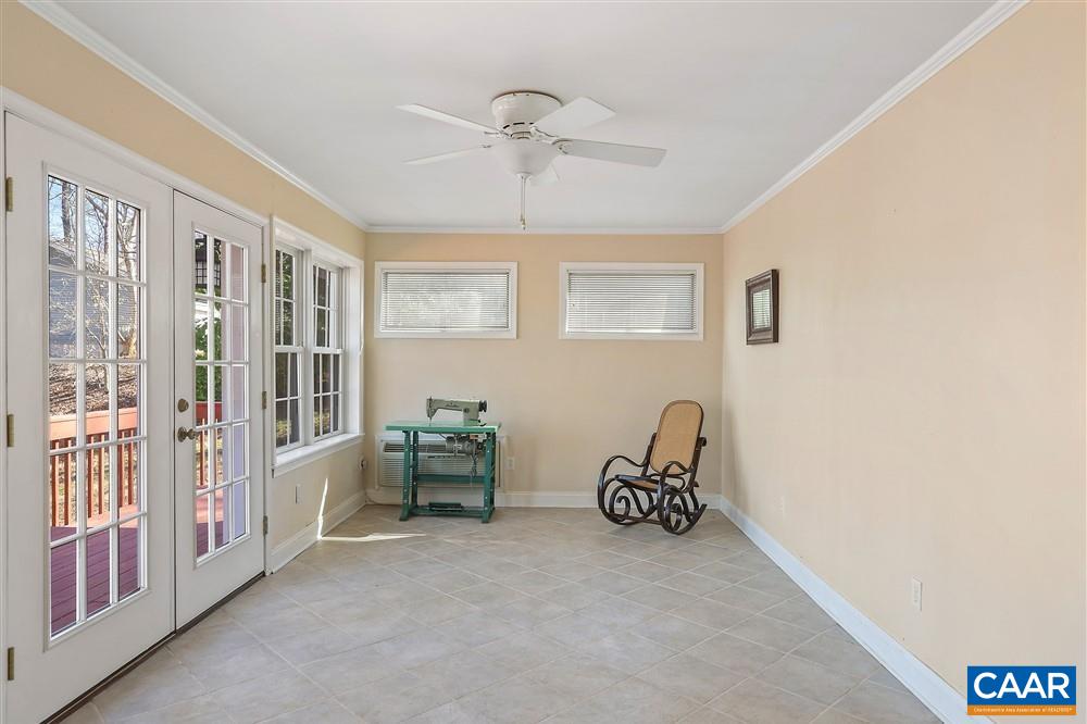 2807 Northfield Road Charlottesville, VA 22901 - Photo 12 of 35 a room with furniture and a chandelier