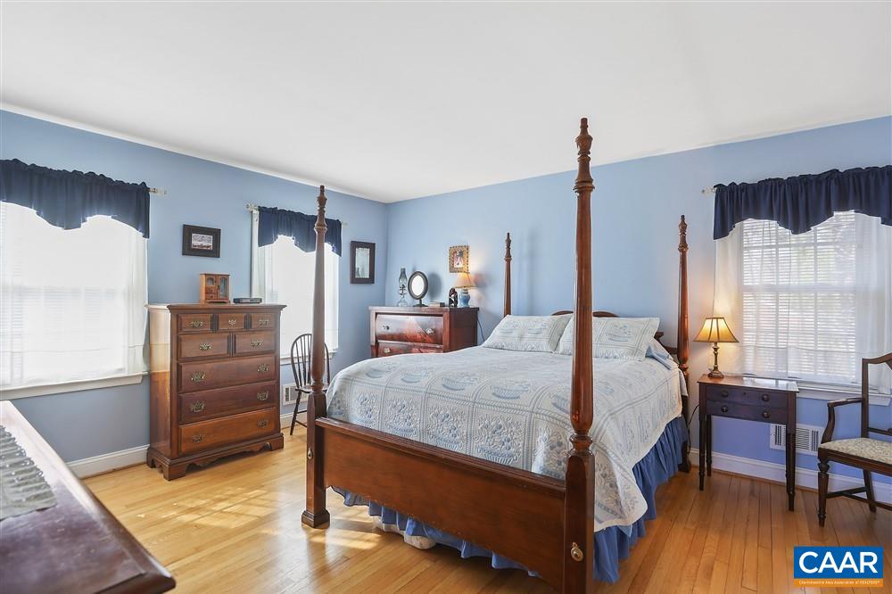 2807 Northfield Road Charlottesville, VA 22901 - Photo 16 of 35 a bed room with a bed and furniture