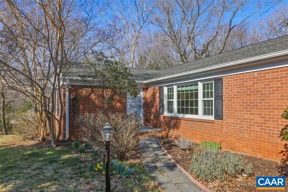 2807 Northfield Road Charlottesville, VA 22901 - Photo 2 of 35 a front view of a house with garden