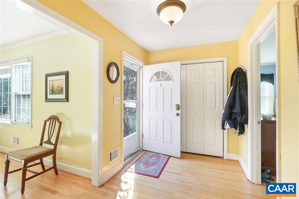 2807 Northfield Road Charlottesville, VA 22901 - Photo 5 of 35 a view of a hallway with furniture and a large window