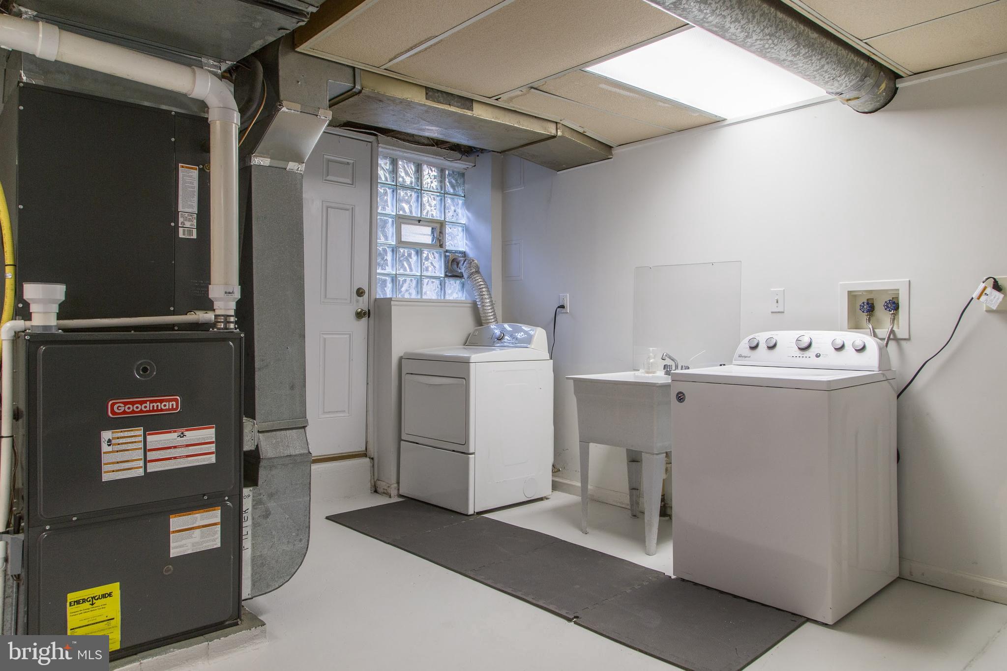 3903 Netherfield Road Philadelphia, PA 19129 - Photo 33 of 42 basement laundry with outside egress