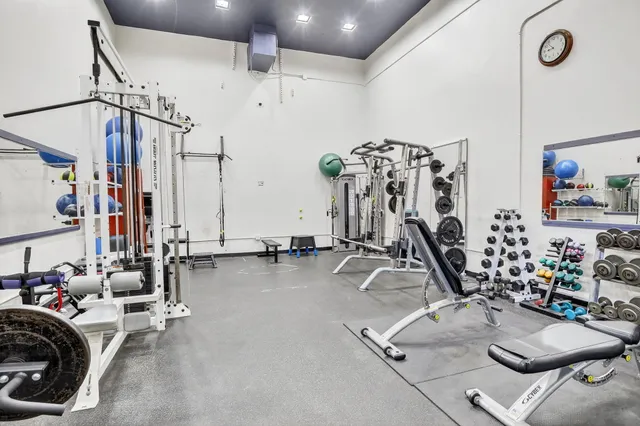 a view of a room with gym equipment