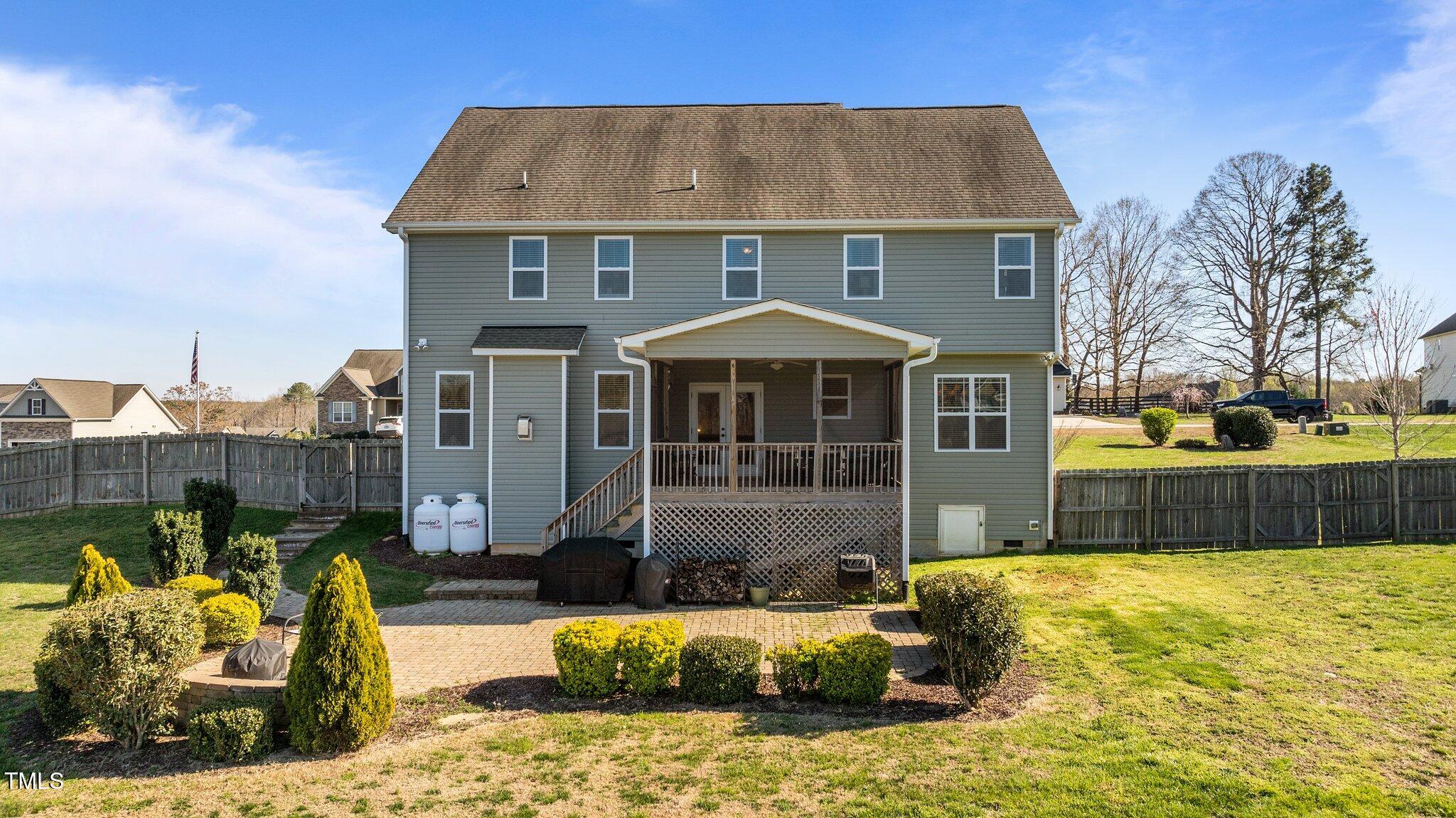 1036 Butterfly Circle Wake Forest, NC 27587 - Photo 10 of 51 a front view of a house with a garden