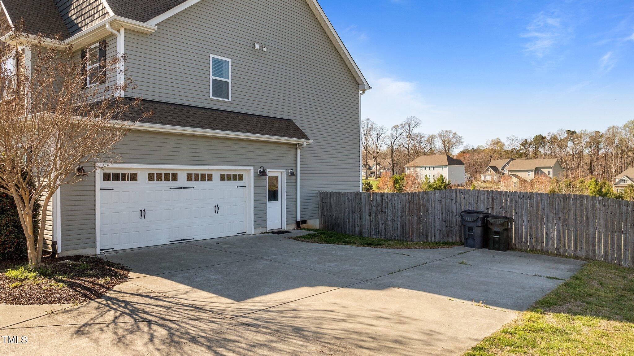 1036 Butterfly Circle Wake Forest, NC 27587 - Photo 20 of 51 a view of a front of house with a garage