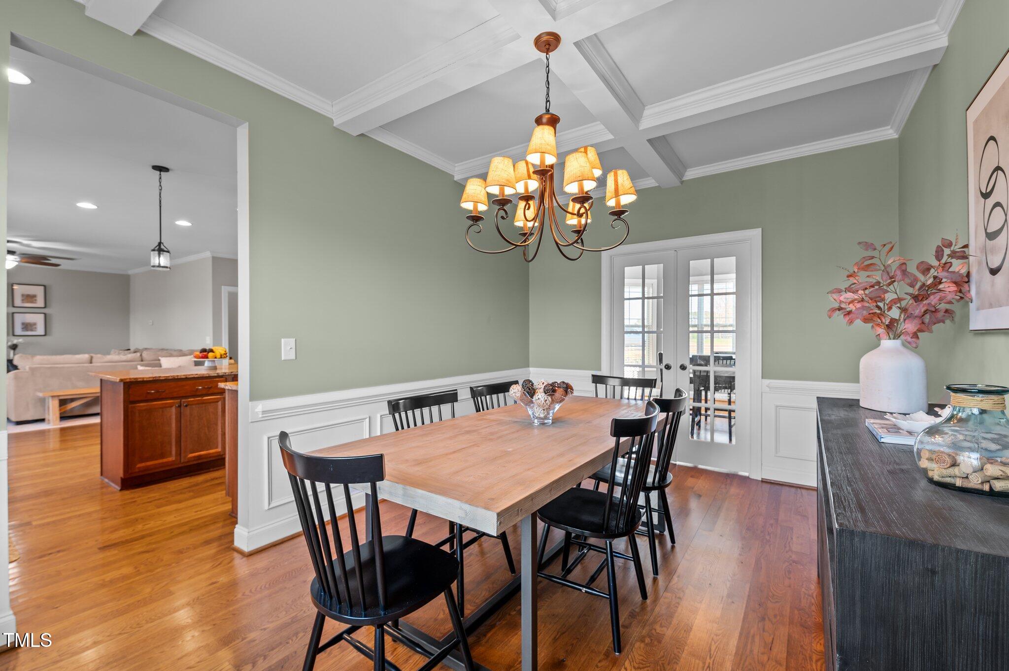 1036 Butterfly Circle Wake Forest, NC 27587 - Photo 35 of 51 a view of a dining room with furniture and wooden floor