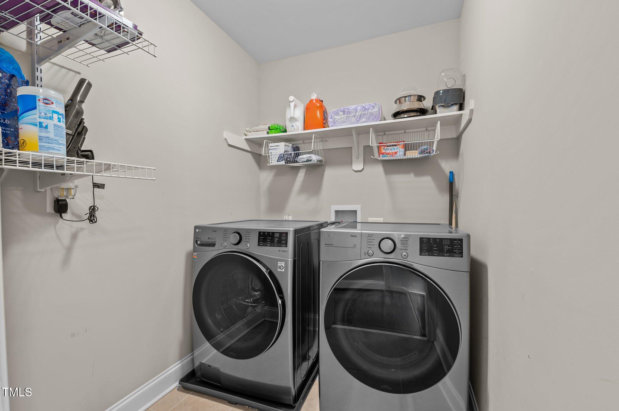 1036 Butterfly Circle Wake Forest, NC 27587 - Photo 38 of 51 a utility room with dryer and washer
