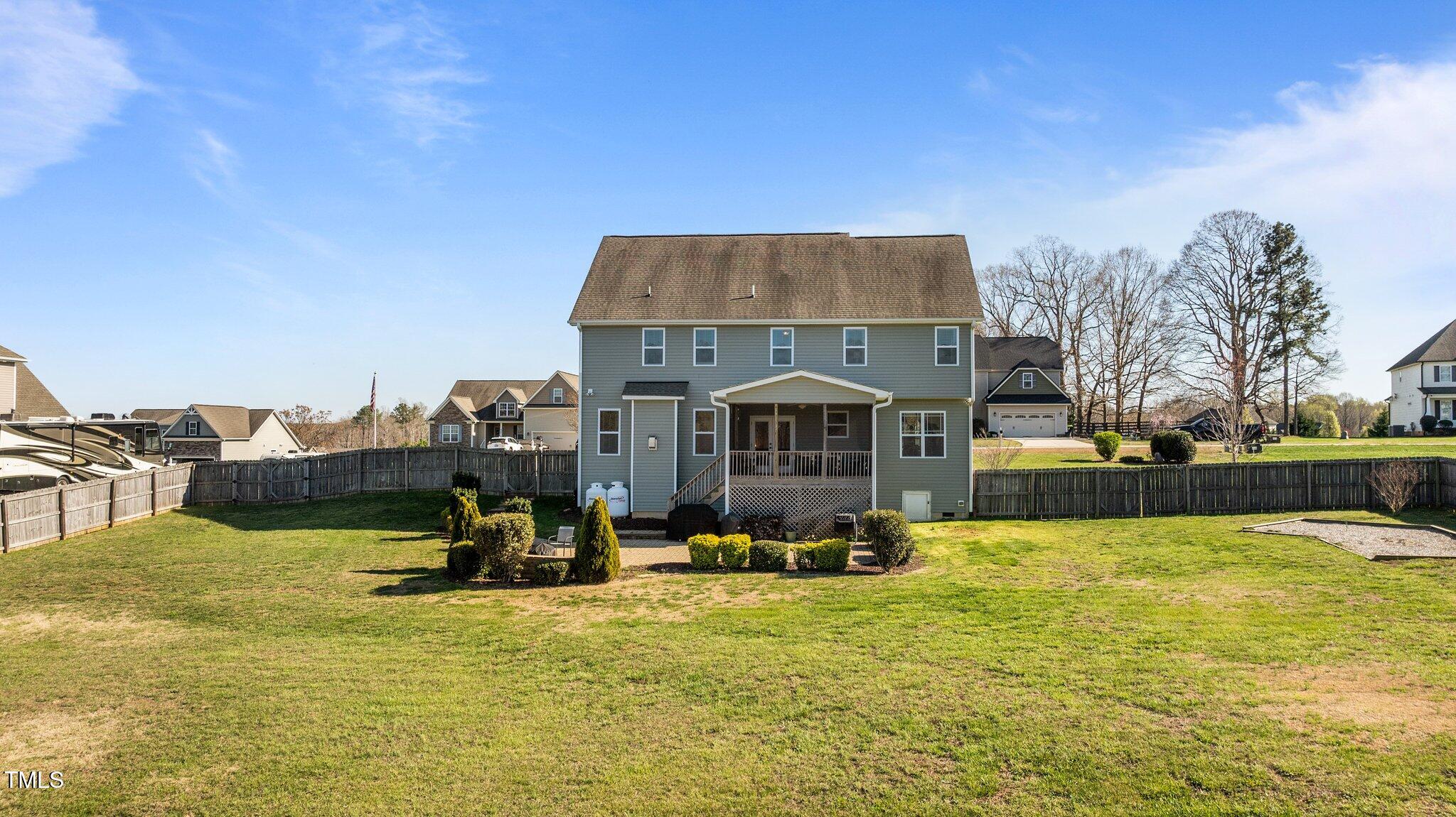 1036 Butterfly Circle Wake Forest, NC 27587 - Photo 9 of 51 a view of a swimming pool with a house