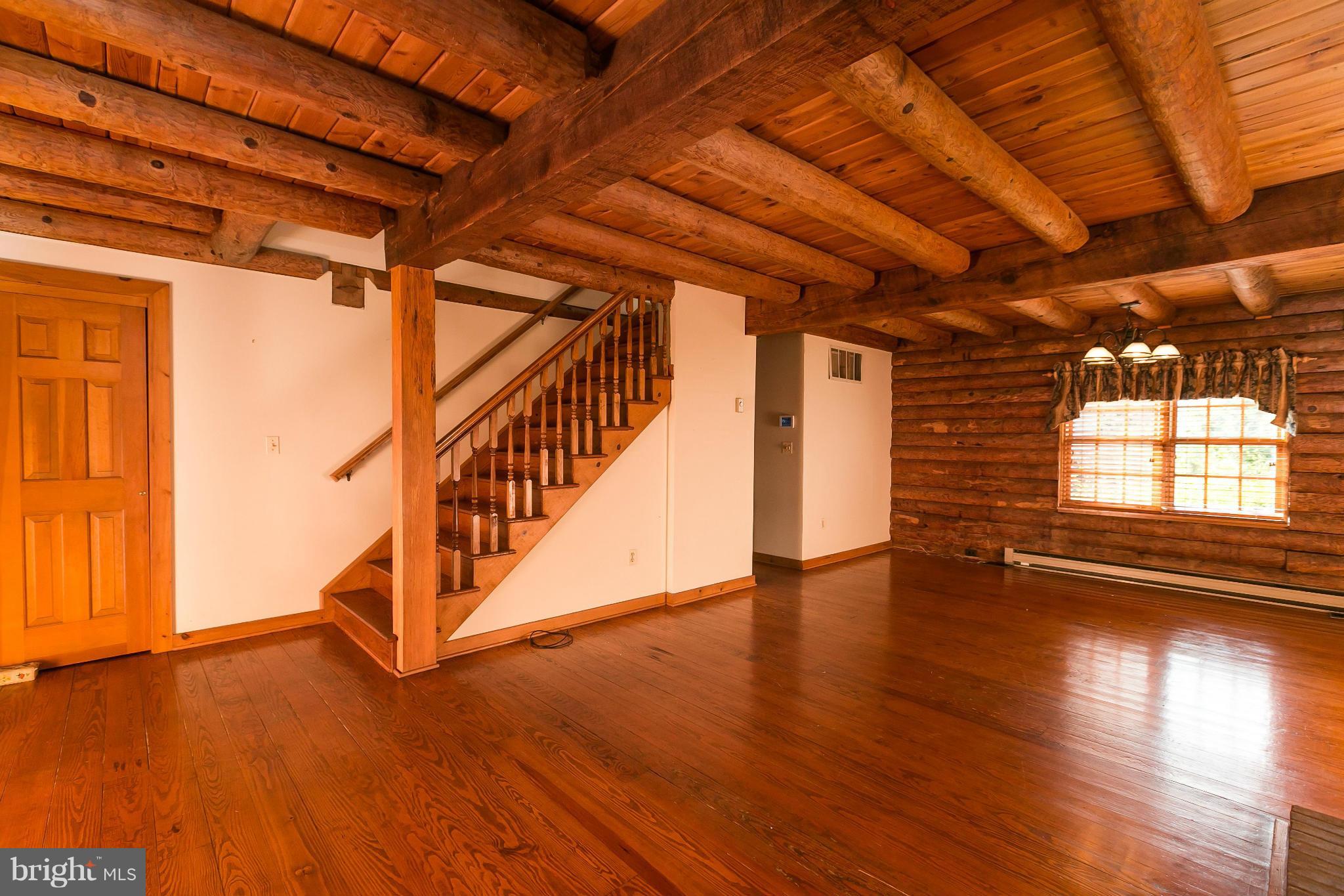 1725 Gablehammer Road Westminster, MD 21157 - Photo 16 of 30 an empty room with wooden floor and windows