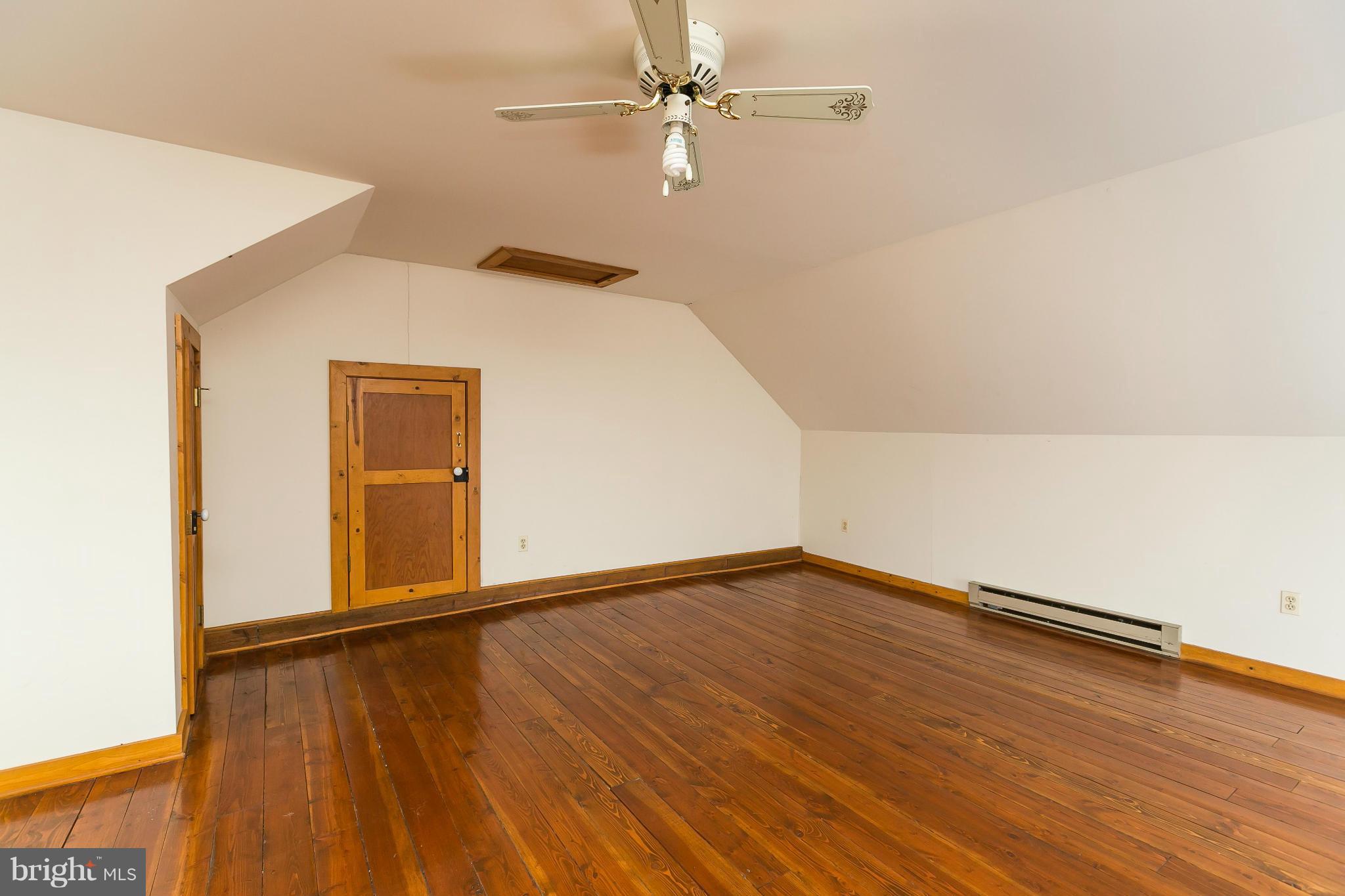 1725 Gablehammer Road Westminster, MD 21157 - Photo 17 of 30 an empty room with wooden floor closet and windows