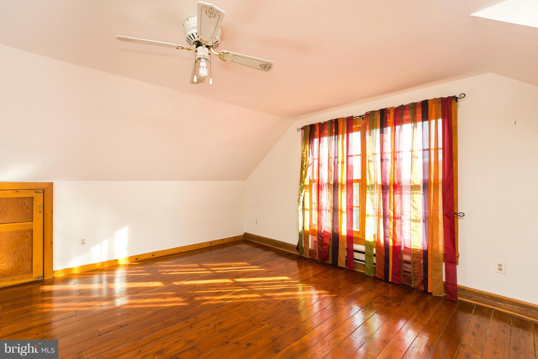 1725 Gablehammer Road Westminster, MD 21157 - Photo 18 of 30 wooden floor in an empty room with a window