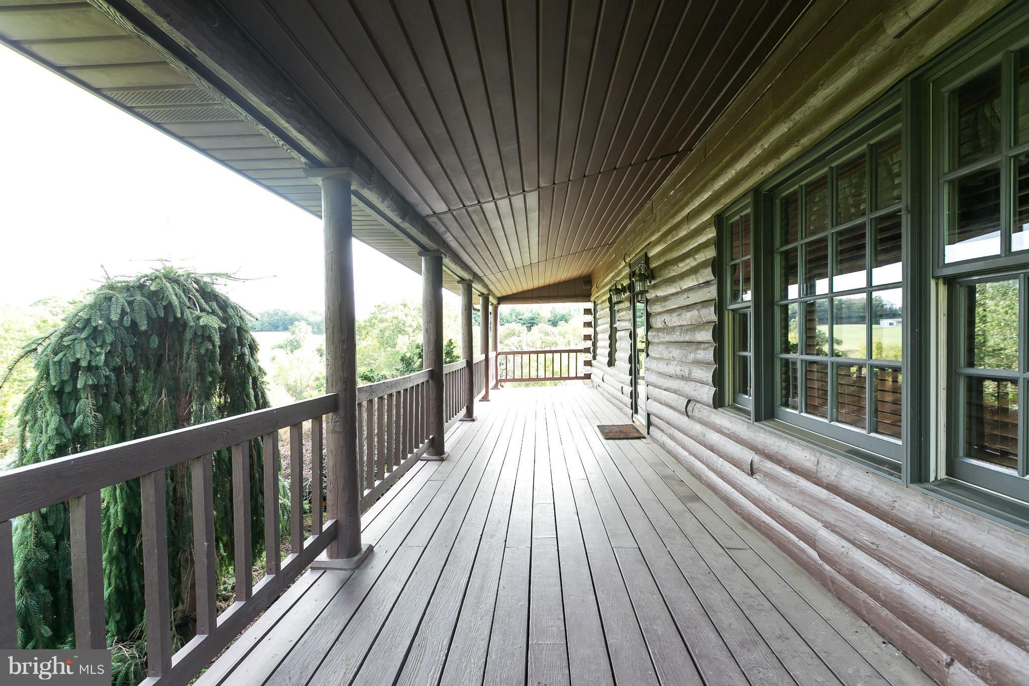 1725 Gablehammer Road Westminster, MD 21157 - Photo 5 of 30 a view of balcony with wooden floor