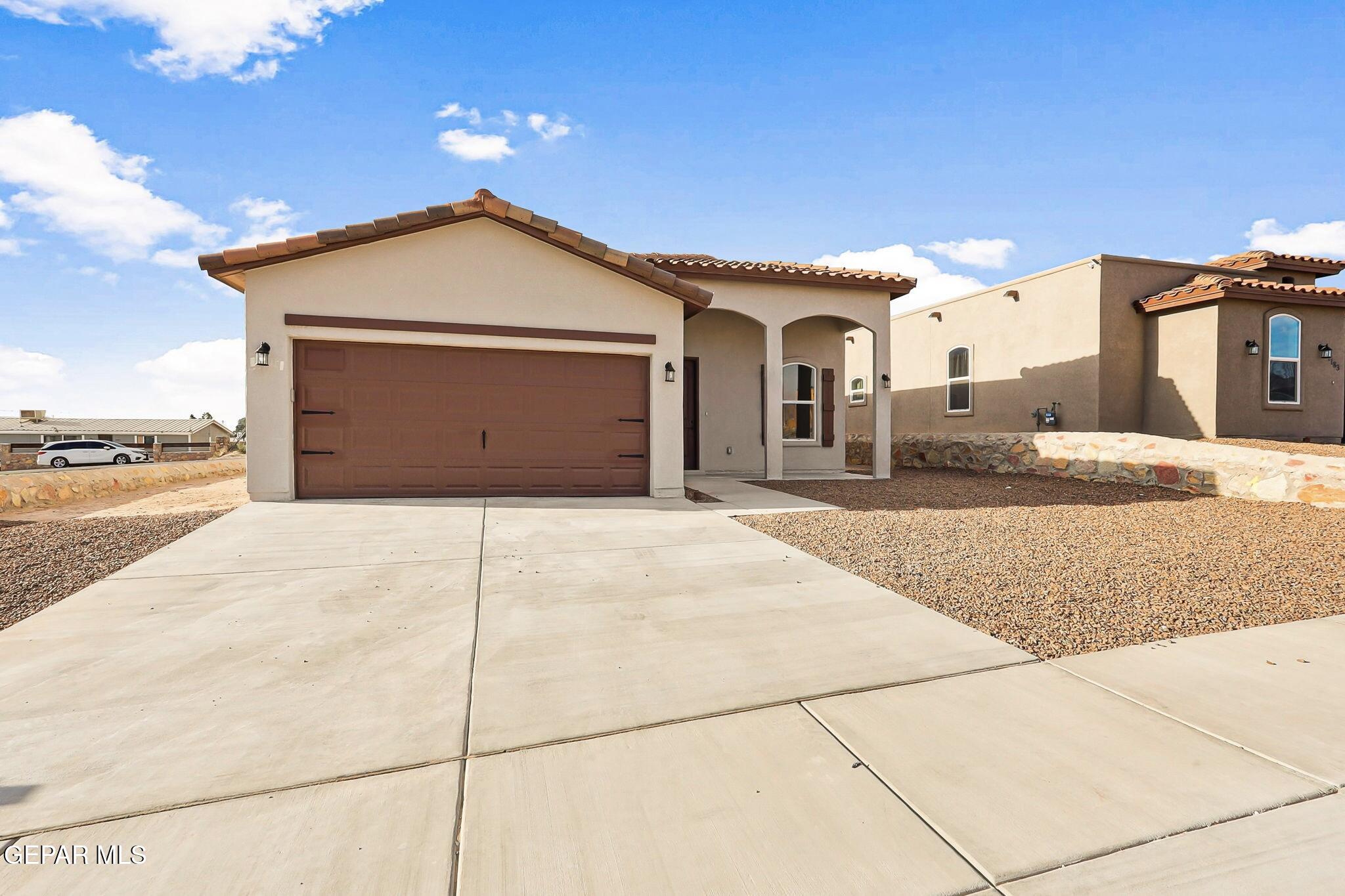 1153 Marquitos Avenue Anthony, NM 88021 - Photo 3 of 40 a view of a house with a outdoor space