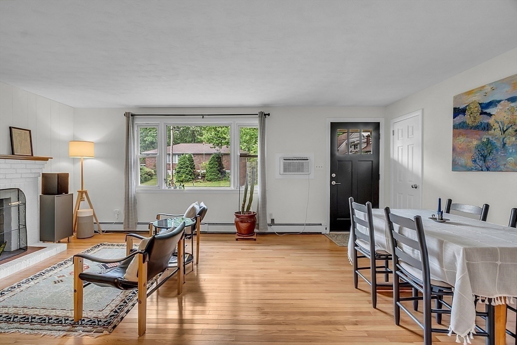 33 Wendover Road Worcester, MA 01606 - Photo 16 of 42 a living room with furniture a large window and wooden floor