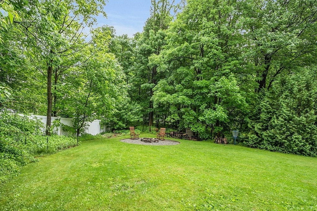 33 Wendover Road Worcester, MA 01606 - Photo 2 of 42 a view of green field with trees in the background