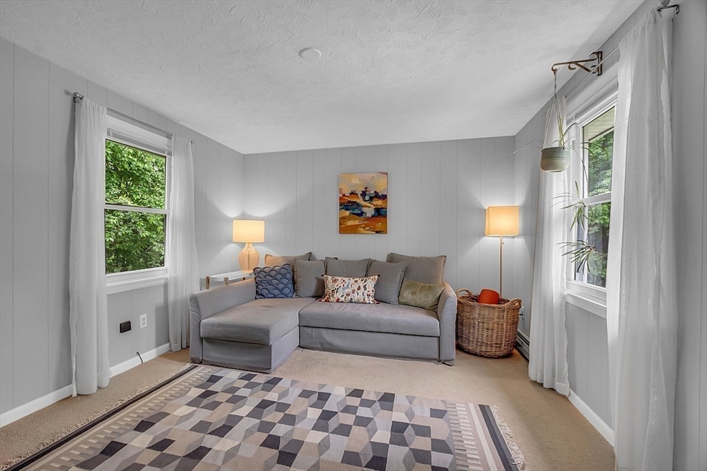 33 Wendover Road Worcester, MA 01606 - Photo 22 of 42 a living room with furniture and a window