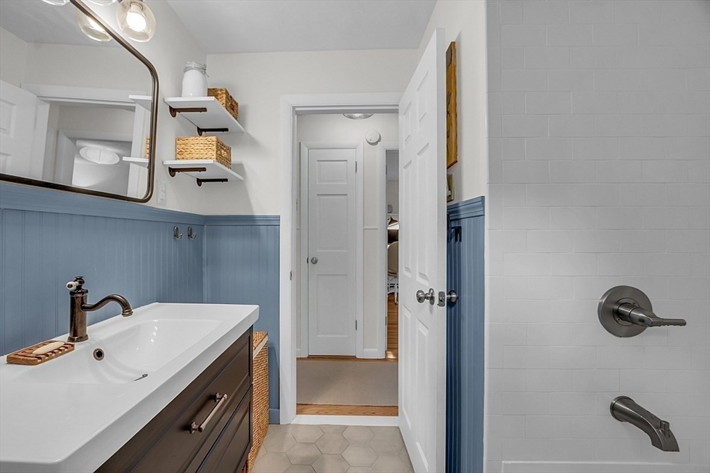 33 Wendover Road Worcester, MA 01606 - Photo 30 of 42 a bathroom with a sink and a mirror