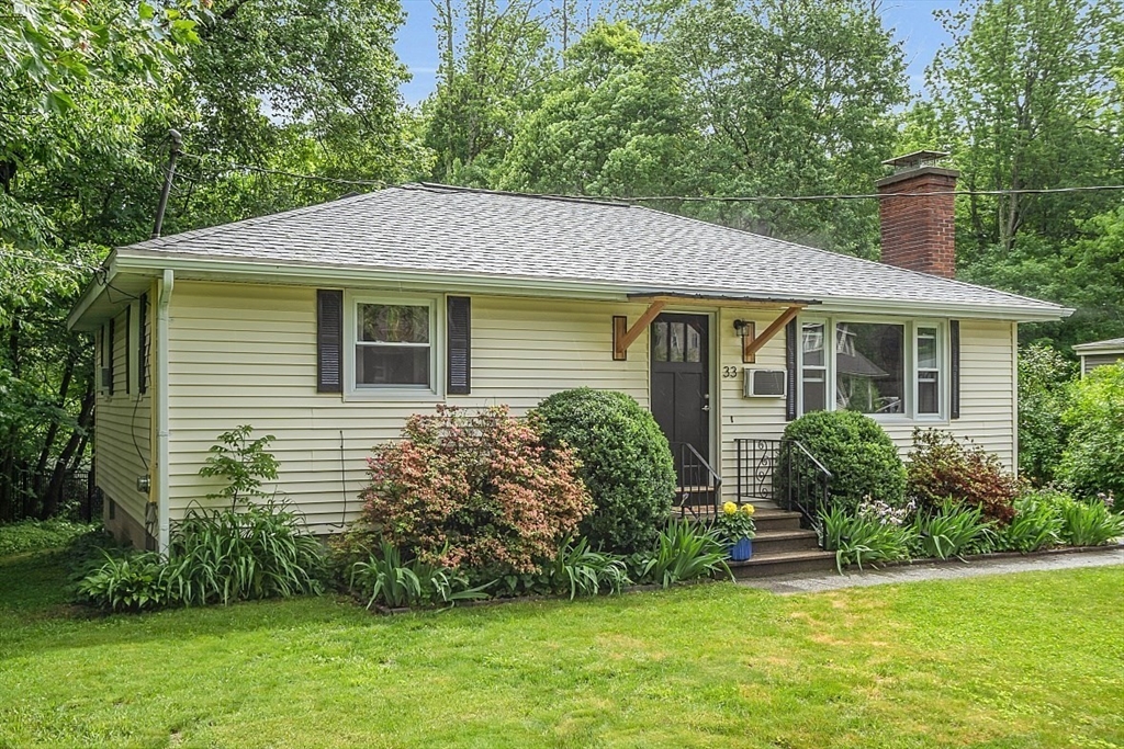 33 Wendover Road Worcester, MA 01606 - Photo 40 of 42 a front view of a house with a garden