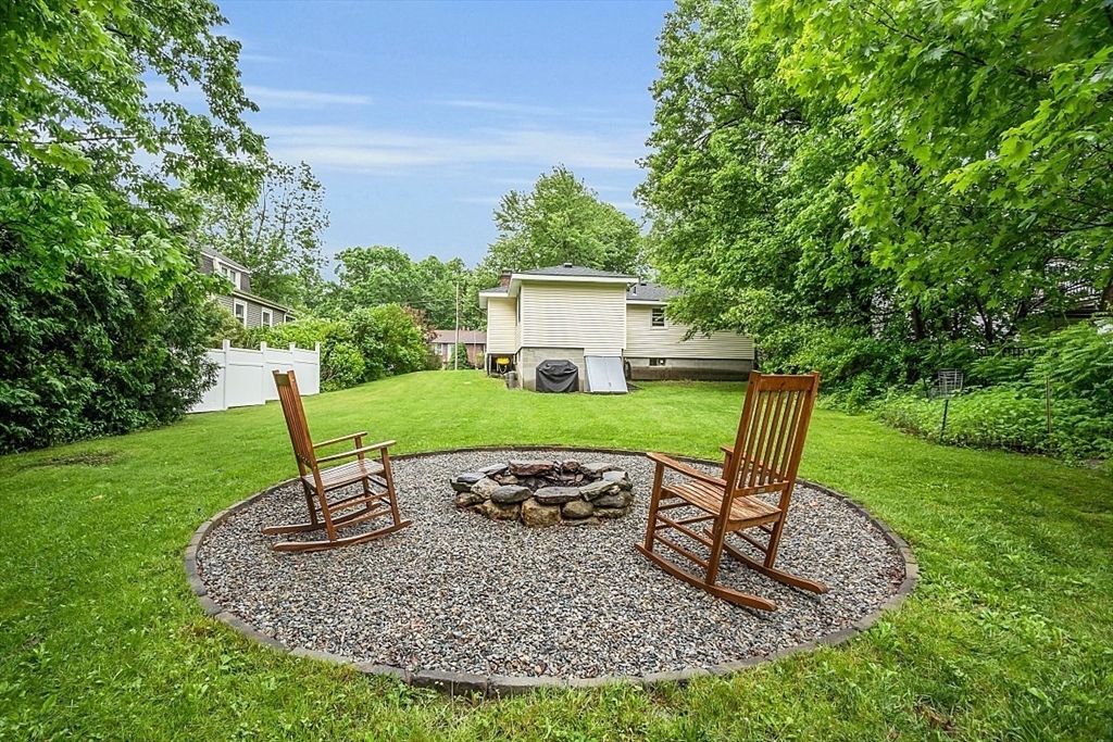 33 Wendover Road Worcester, MA 01606 - Photo 4 of 42 a view of a house with backyard sitting area and furniture
