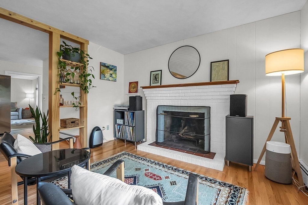 33 Wendover Road Worcester, MA 01606 - Photo 7 of 42 a living room with furniture and a fireplace