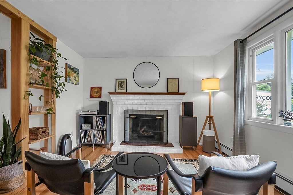 33 Wendover Road Worcester, MA 01606 - Photo 8 of 42 a living room with furniture and a fireplace