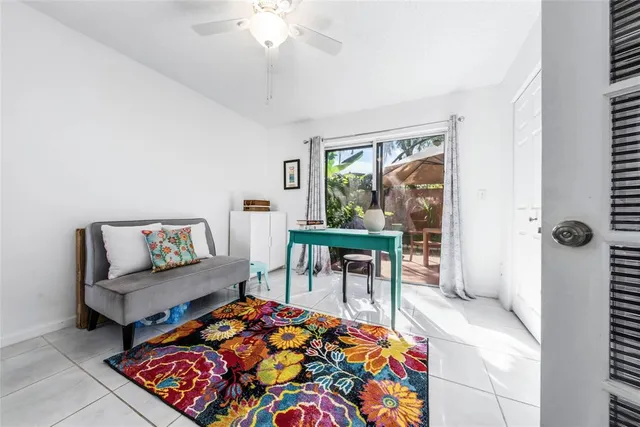 a living room with furniture and a table