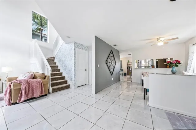 a view of kitchen with furniture and entryway