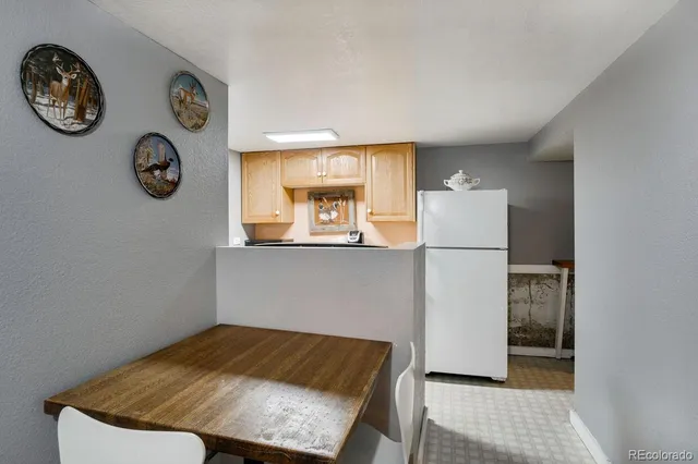 a view of an oven with a refrigerator