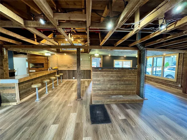 a view of an empty room and a window