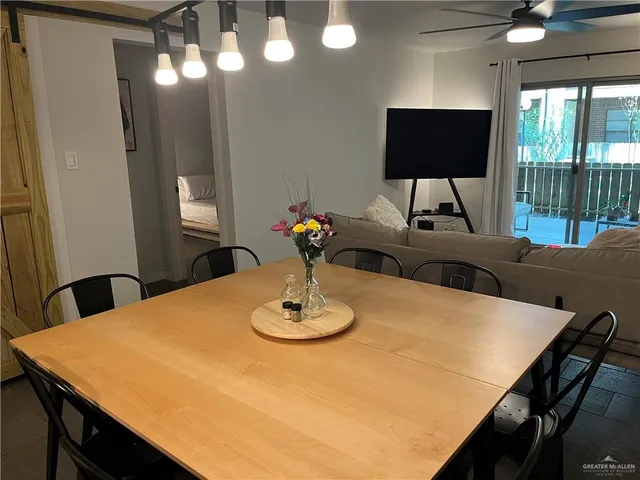 a view of a dining room with furniture