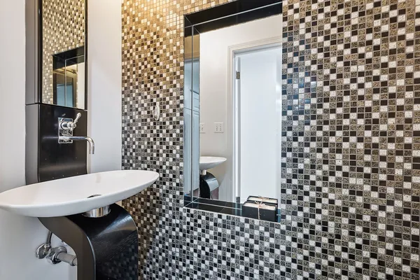 a spacious bedroom with a bed and a window