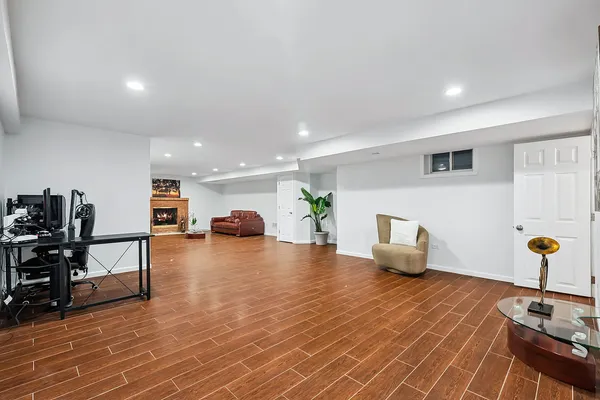 a bedroom with a bed and a table