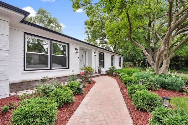front view of a house with a yard