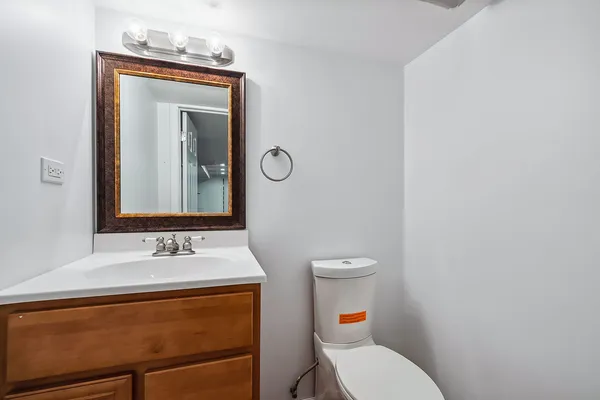 a utility room with cabinets washer and dryer